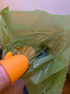 Grabby: poop bag opener