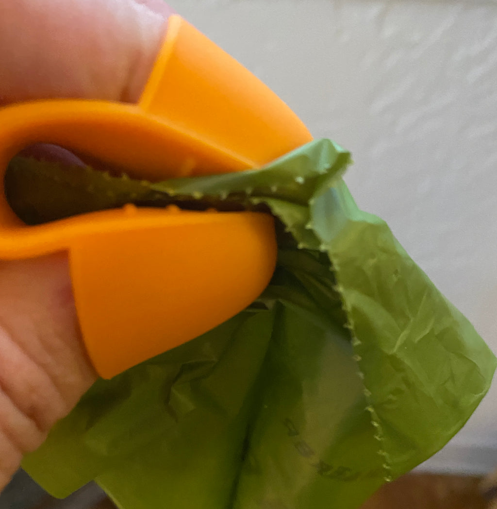 Grabby: poop bag opener