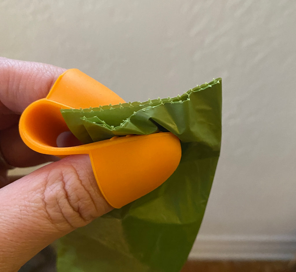 Grabby: poop bag opener